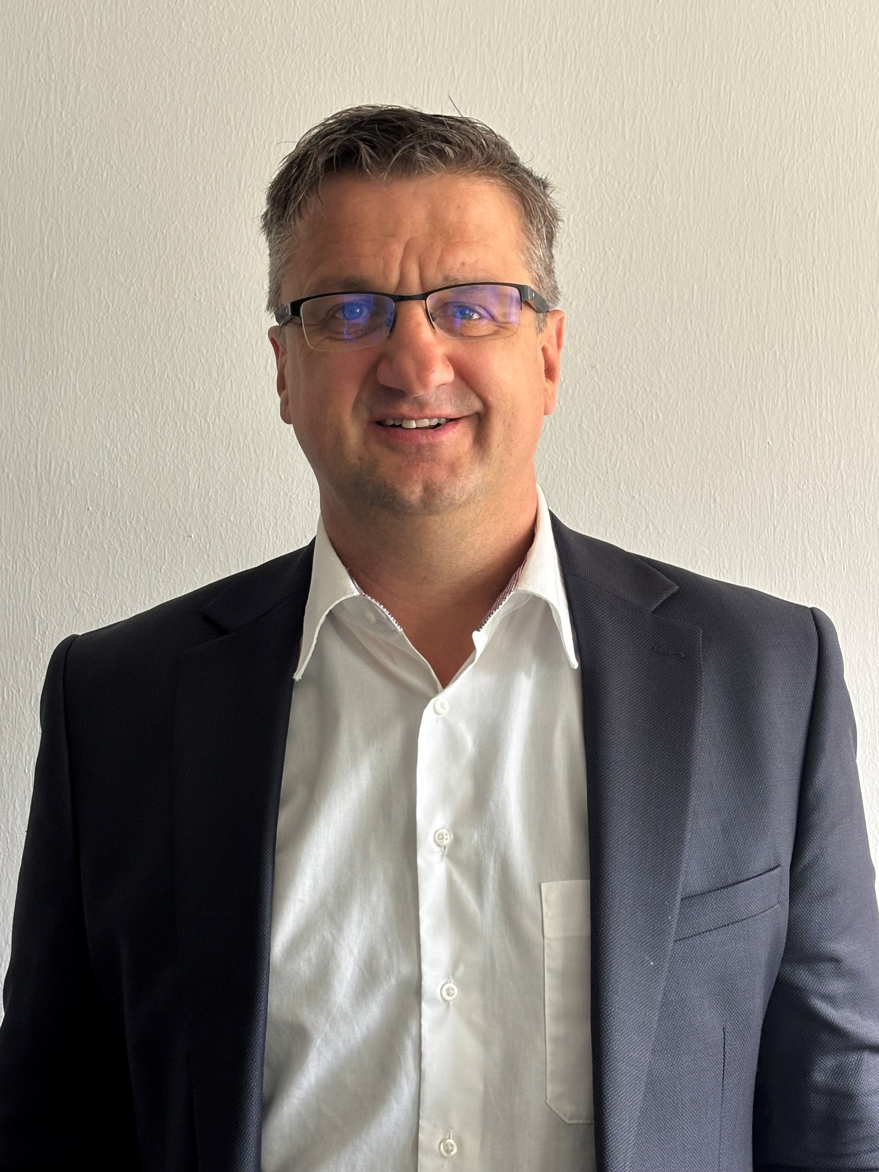 Mr. Christian Käser